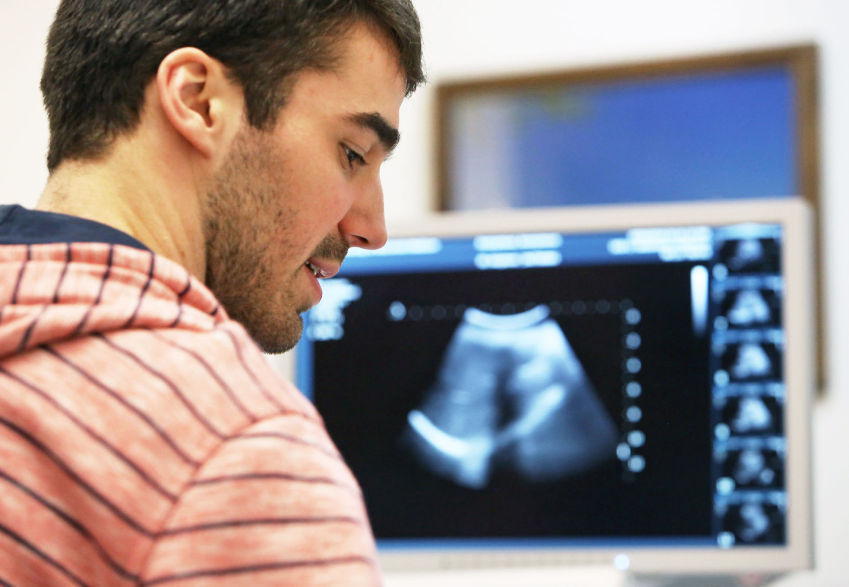 Justin with ultrasound in background